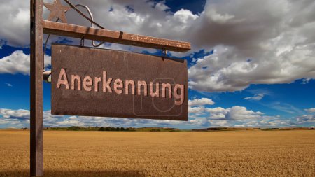 Téléchargez les photos : Image montrant un panneau indiquant la direction de la reconnaissance obtenue en allemand. - en image libre de droit