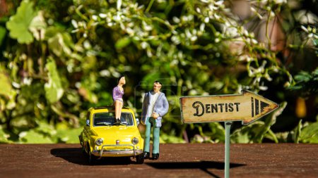 Téléchargez les photos : La rue signe le chemin du dentiste - en image libre de droit