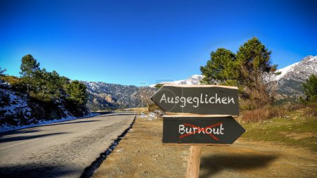 An image with a signpost pointing in two different directions in German. One direction points to Balanced, the other points to Burnout
