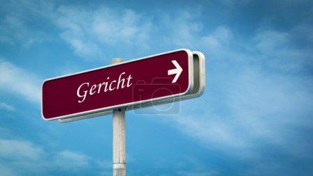 The picture shows a signpost and a sign that points in the direction of the court in German.