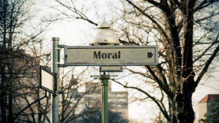 ein Bild mit Hinweisschildern in Richtung Moral auf Deutsch