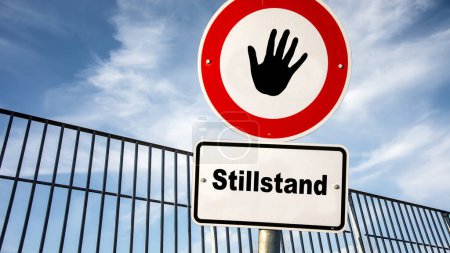 An image with a signpost pointing in two different directions in German. One direction points to movement, the other points to standstill.