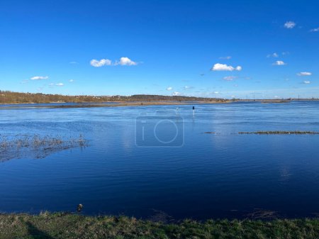 Photo for Beautiful spring landscape.River flood. Blue sky. Reflections in the water. - Royalty Free Image