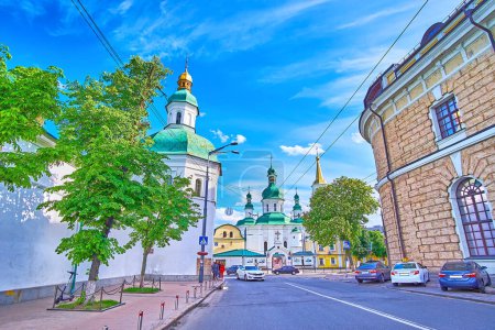 Photo for Lavrska street in Pechersk district with wall and bell towers of Kyiv Pechersk Lavra Monastery (Monastery of the Caves) and St Theodosius Pechersky Monastery, Kyiv, Ukraine - Royalty Free Image