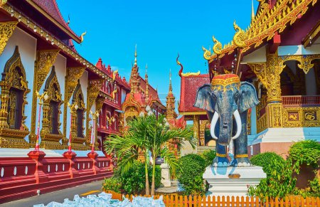 Photo for The statue of elephant in front of the main Viharn hall of splendid Wat Saen Muang Ma temple complex, Chiang Mai, Thailand - Royalty Free Image