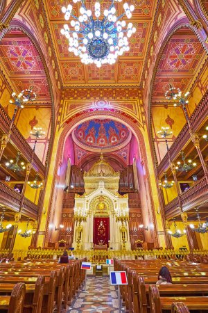 Photo for BUDAPEST, HUNGARY - FEB 22, 2022: Interior of Dohany Street Synagogue with carved Torah Ark and richly decorated ceiling with painted geometric patterns, on Feb 22 in Budapest - Royalty Free Image