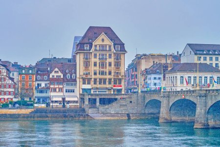 Photo for BASEL, SWITZERLAND - APRIL 1, 2022: Historic buildings of Altstadt Kleinbasel district on bank of Rhine river, on April 1 in Basel, Switzerland - Royalty Free Image