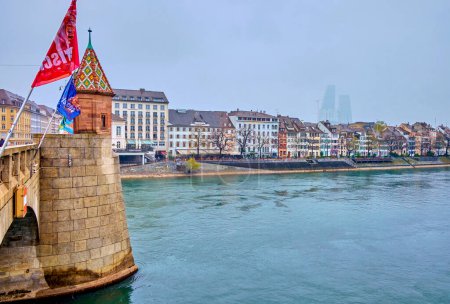 Photo for BASEL, SWITZERLAND - APRIL 1, 2022: New Town side of Rhine river and Mittlere Brucke, on April 1 in Basel, Switzerland - Royalty Free Image
