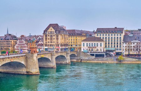 Photo for BASEL, SWITZERLAND - APRIL 1, 2022: New Town side of Basel and Mittlere Brucke on rainy day, on April 1 in Basel, Switzerland - Royalty Free Image