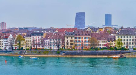 Photo for Historical riverside houses and modern office buildings on background in Basel, Switzerland - Royalty Free Image