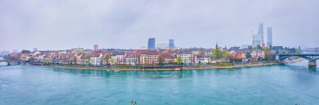 Photo for Panoramic view on modern part of Basel with traditional houses on the riverbank of Rhine river, Switzerland - Royalty Free Image