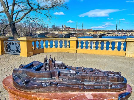 Photo for The viewing terrace of Slavonic Island with a view on Vltava River and St Vitus Cathedral behind its model, Prague, Czechia - Royalty Free Image
