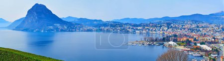 Photo for The Lake Lugano, mountains and Lugano city  seen from the San Michele Park, Castagnola, Lugano, Ticino, Switzerland - Royalty Free Image