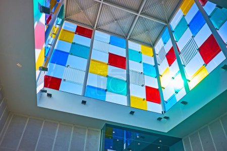 Photo for MALAGA, SPAIN - SEPT 28, 2019: Interior of Centre Pompidoy Museum with glass and steel construction of the famous El Cubo (The Cube) from inside - Royalty Free Image