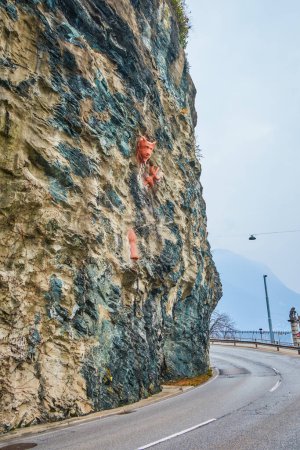The sculpture of the Devil on Ponte del Diavolo (Devil's bridge) in Castagnola, Lugano, Switzerland