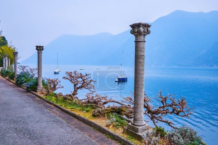 Photo for The lakeside path in Park Villa Heleneum on Lake Lugano, Lugano, Switzerland - Royalty Free Image