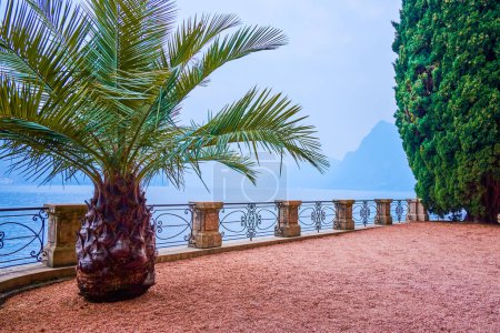 Photo for The terrace on the bank of Lugano Lake in Park Villa Heleneum, Lugano, Switzerland - Royalty Free Image