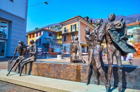 Photo for LOCARNO, SWITZERLAND - MARCH 26, 2022: Impressive sculptural group La Visita by Nag Arnoldi on Via dell'Ospedale in front of La Carita Hospital, Locarno, Switzerland - Royalty Free Image