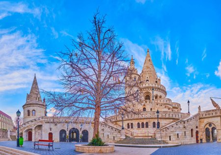 Observe the walls and towers of historic Fisherman's Bastion from the Holy Trinity Square, Budapest, Hungary