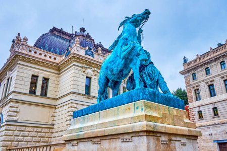 The statue to the horse trainer in front of the Royal Riding Hall on Foal Courtyard of Buda Castle, Budapest, Hungary
