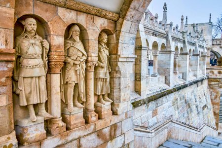 Statues of the medieval warriors of Arpad dynasty on walls of the gate over the staircase of Fisherman's Bastion in Budapest, Hungary