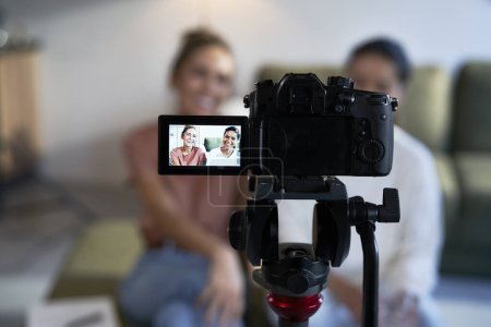 Photo for Selective focus on two female vloggers recording a movie - Royalty Free Image