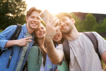 Photo for Group of caucasian students taking selfie outside the university campus - Royalty Free Image
