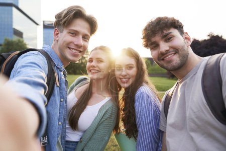 Photo for Portrait of four caucasian university students outside the university campus - Royalty Free Image