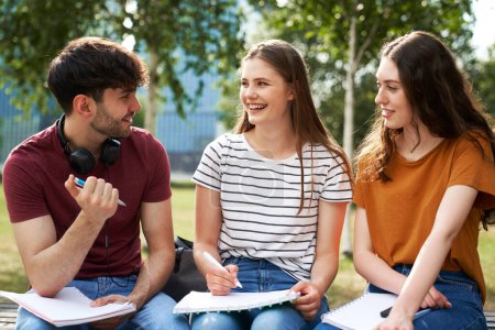 Photo for Group of caucasian students studying outside the university campus - Royalty Free Image