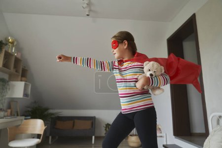 Photo for Caucasian girl playing a role of superhero costume - Royalty Free Image