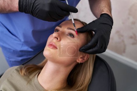 Photo for Facelifting procedure in beauty salon - Royalty Free Image