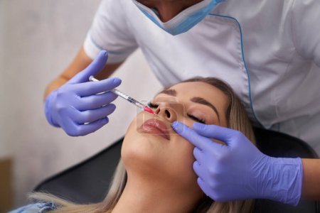 Photo for Woman having beauty procedure in beauty salon - Royalty Free Image