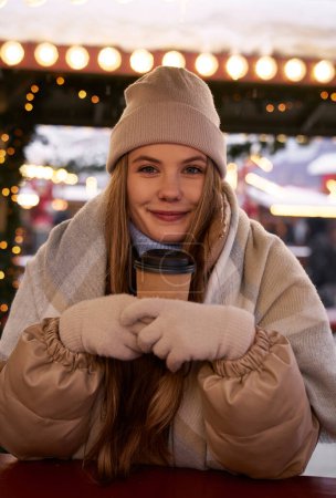 Photo for Portrait of young woman on Christmas market - Royalty Free Image