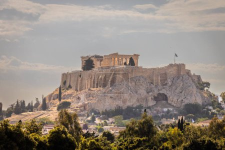 Athens, Greece, May 2nd 2024: Delicious Greek Food in the center of Athens, Greece 2024: The Mighty UNESCO Acropolis of Athens, in the center of Athens, Greece