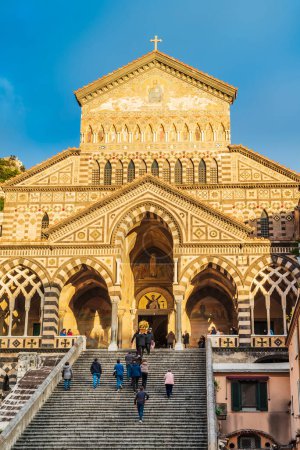Photo for Amalfi, Italy - 26th Dec 2022: Family follow behind casket being lead up the steps of Amalfi Cathedral - Royalty Free Image