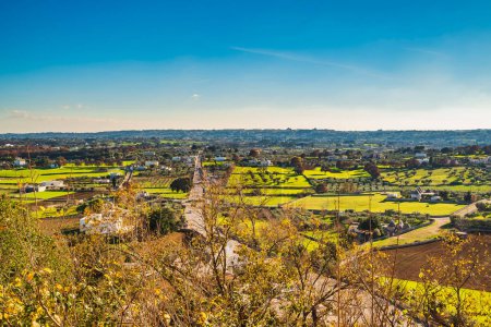 Photo for Aerial view from Locorotondo panoramic point towards Martina Franca town - Royalty Free Image