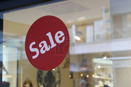 Photo for Sticker with the word Sale on the window of a store in Berlin - Royalty Free Image