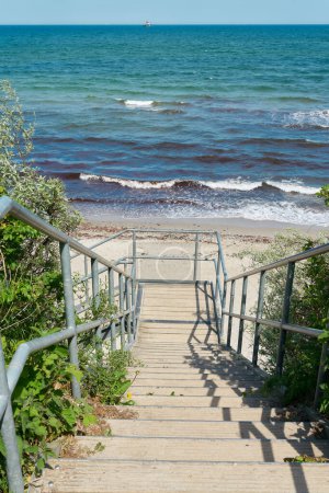 Photo for Stairs to the Baltic Sea beach between the towns of Kuehlungsborn and Heiligendamm in Germany - Royalty Free Image