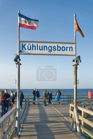 Photo for Kuehlungsborn, Germany  May 25, 2023: Tourists on the popular pier of Kuehlungsborn on the German Baltic coast - Royalty Free Image