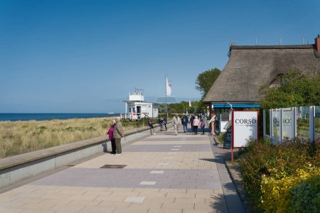 Photo for Kuehlungsborn, Germany  May 24, 2023: Kuehlungsborn beach promenade on the German Baltic Sea coast with holidaymakers and restaurants - Royalty Free Image