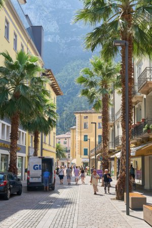 Photo for Riva del Garda, Italy  August 03, 2023: Tourists in the city center of the popular resort of Riva del Garda on Lake Garda in Italy - Royalty Free Image