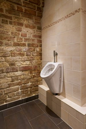 Photo for Urinal in a public toilet in the old town of Prague - Royalty Free Image