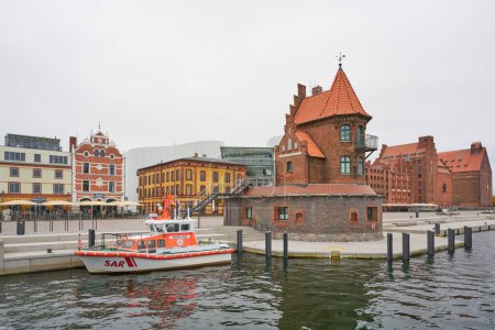 Photo for Stralsund, Germany  November 01, 2023: SAR rescue boat, Hertha Jeep at the pilot house on the promenade in Stralsund in Germany - Royalty Free Image