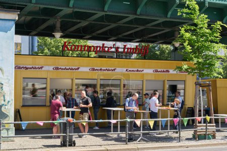 Photo for Berlin, Germany  May 30, 2023: Konnopkes Imbiss, the most famous snack bar in Berlin, since 1930, Konnopke is popular with tourists and Berliners - Royalty Free Image