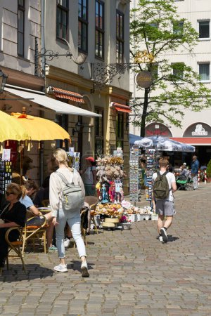 Photo for Berlin, Germany  May 28, 2023: Tourists at a souvenir store in the popular Nikolai quarter in the center of Berlin - Royalty Free Image