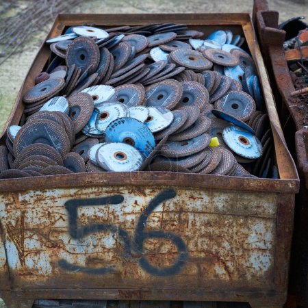 Photo for Magdeburg, Germany  January 31, 2024: Worn, disused cutting-off wheels for metalworking on the site of an abandoned factory in Magdeburg - Royalty Free Image