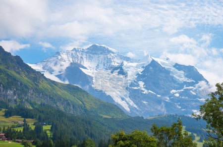 Photo for Famous Jungfraujoch mountain glacier, view from Wengen, alpine landscape Bernese Oberland, switzerland - Royalty Free Image