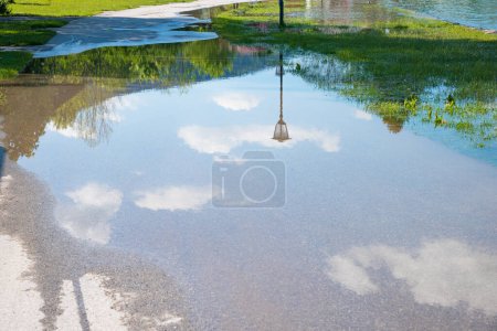 Photo for Path flooded by water on the lakeshore, after a period of heavy rain, upper bavaria - Royalty Free Image