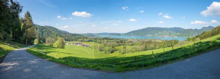 view from hiking trail above Kleinbuch, to lake Tegernsee and alps, spring landscape panorama upper bavaria