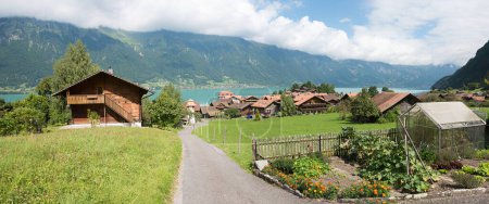 walkway to beautiful tourist resort Iseltwald, landscape Bernese Oberland, switzerland